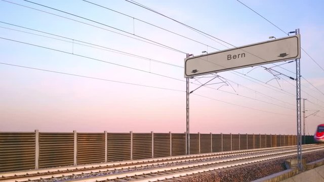 bern train station signboard,train travels under railway billboard