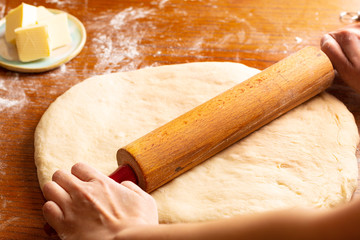 Food bakery concept making bread dought for Cinnamon Roll Braided Bread with copy space