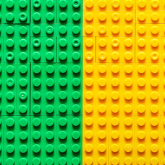 Green yellow toy construction background