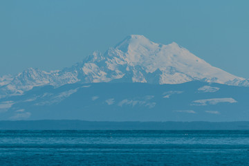 Mt Baker over Puget Sound landscape background with various shades of blue