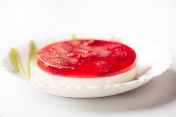 Homemade strawberry cake on white background 