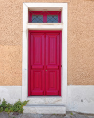 Fototapeta premium vintage house red door, Plaka old neighborhood, Athens Greece