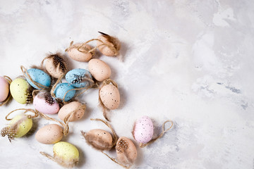Decorative Easter eggs on stone background. Easter background. Top view, copy space