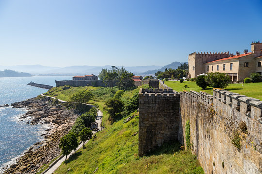 Baiona, Spain. Monterreal Fortress on the ocean. The fortress is included in the list of the most picturesque historical buildings of UNESCO