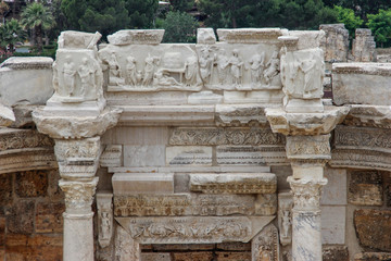 The ruins of the ancient ancient city of Hierapolis with columns, gates and graves in Pamukalle, Turkey