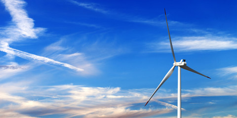 Fototapeta premium Wind turbine and multicolor sunrise sky