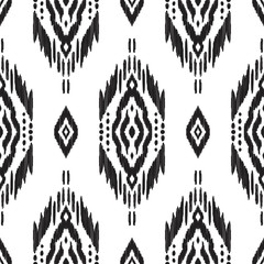 Black and white seamless background. Ethnic ikat, navajo, cherokee ornament. Vector illustration. Tribal pattern. Can be used for textile, wallpaper, wrapping paper, greeting card backdrop, print. - 257952721