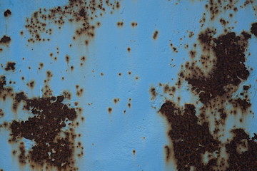blue background - rusty container