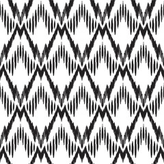 Black and white seamless background. Ethnic ikat ornament. Vector illustration. Tribal pattern. Can be used for textile, wallpaper, wrapping paper, greeting card backdrop, print.