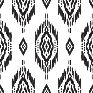 Black and white seamless background. Ethnic ikat, navajo, cherokee ornament. Vector illustration. Tribal pattern. Can be used for textile, wallpaper, wrapping paper, greeting card backdrop, print.