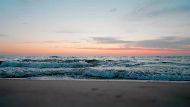 4K Slow Motion Wide Shot of Seascape: Beautiful Vanilla Sunset over Sea Waves and Beach in Summer