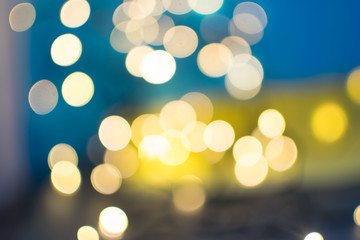 Abstract Yellow Bokeh Circles on Blurred Background