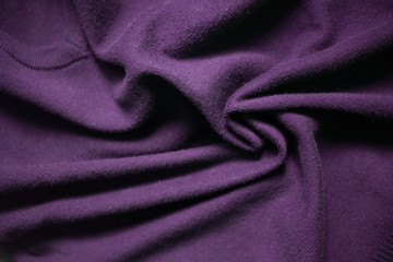 Background texture pattern   wrinkled  purple fabric.