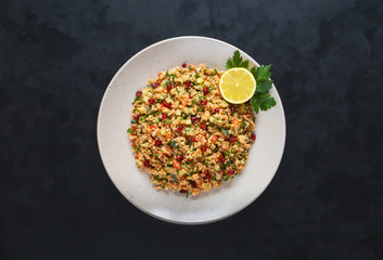 Ramadan food. Salad with couscous and pomegranate.