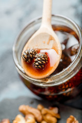 various cheeses on a plate with sauces and.confitures, honey and nuts