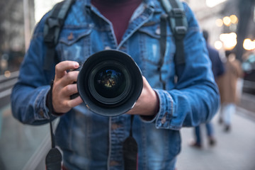 photographer hand camera