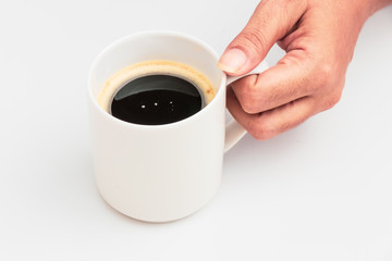 girl's hands holding coffee cup with plant flat lay top view