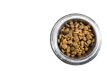 dry pet - dog food in metal bowl on white background top view
