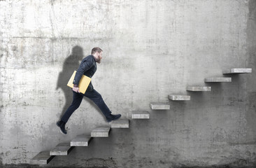 Side view of a man climbing up the steps in a blank concrete wall. 3d render
