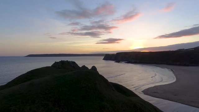 Aerial view of Three Cliffs Bay south coast beach the Gower Peninsula Swansea Wales uk