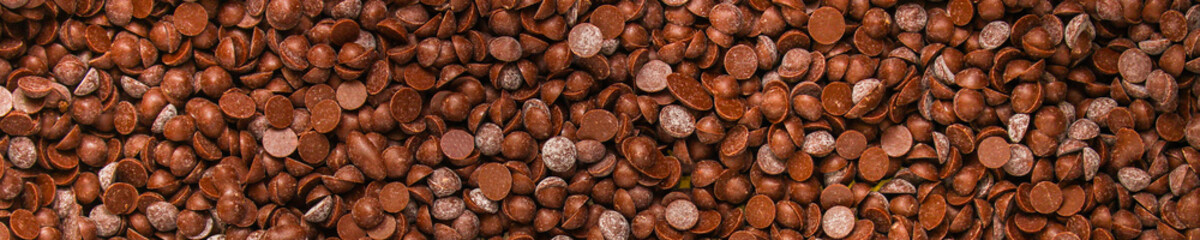 chocolate drops (sweets). food background. copy space. top