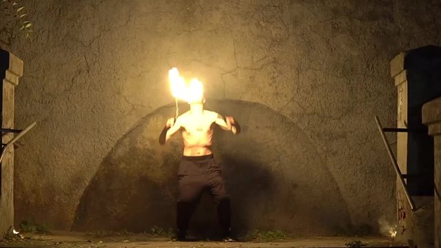 Slow Motion Male Artist Of The Spins Fire Poi 