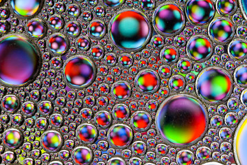 Abstract textured background of colorful oil and water bubbles