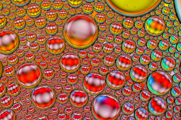 AbstAbstract textured background of colorful oil and water bubblesract textured background of colorful oil and water bubbles