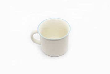 White ceramic cup with handle and blue rim