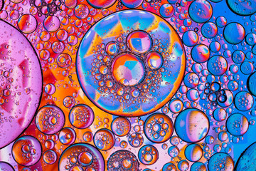Abstract textured background of colorful oil and water bubbles