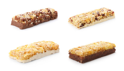 Set of different sweet protein bars on white background