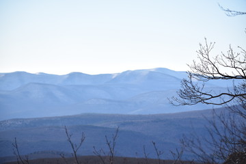 winter landscape with mountains and clouds