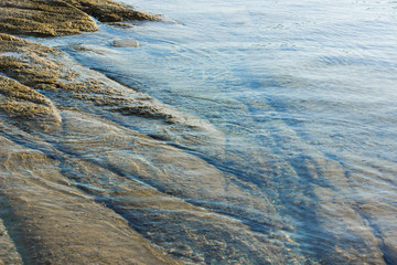 calming north river stone waterfront shoreline shallow water local scenic background concept landscape, copy space