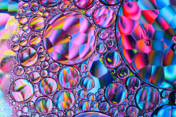 Abstract textured background of colorful oil and water bubbles