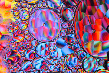 Abstract textured background of colorful oil and water bubbles