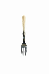 Shiny metal fork with pattern and beige handle.
