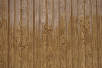 The Metal Profile. Metal profile background under the texture of wooden boards