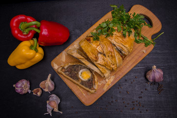 Egg roll with greens, pepper and garlic