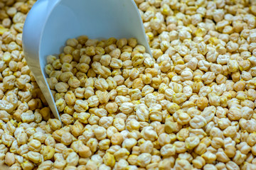 Food background from a texture of raw chickpeas close-up