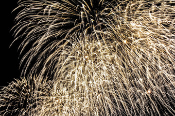 Explosion of multi-colored fireworks in Dubai against the night sky on a new year celebrations holidays