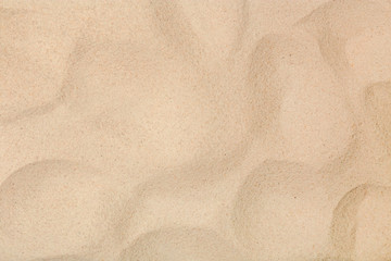 Fototapeta na wymiar Dry beach sand as background, top view