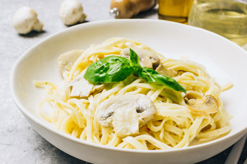 Pasta fettuccine with mushrooms and creamy cheese sauce