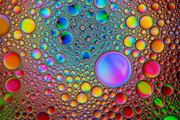 Abstract textured background of colorful oil and water bubbles