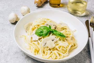 Pasta fettuccine with mushrooms and creamy cheese sauce