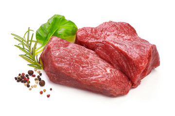 Raw ribeye beef steak with rosemary, sliced fresh meat, close-up, isolated on white background