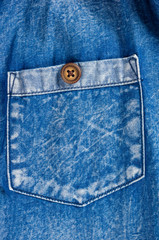 Blue washed faded jeans texture with seams, clasps, buttons and rivets