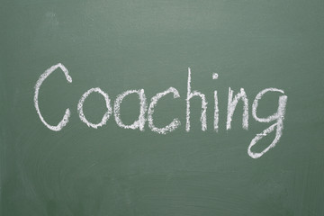 inscription in chalk on a blackboard Coaching