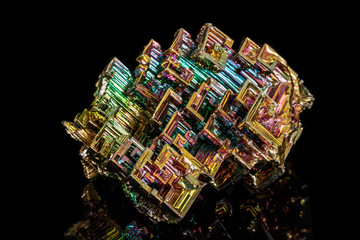 Macro of the stone bismuth mineral on a black background