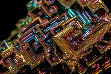 Macro of the stone bismuth mineral on a black background