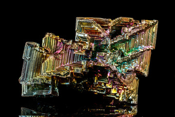 Macro of the stone bismuth mineral on a black background